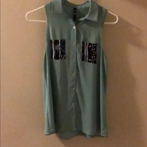 Blue tank top with Aztec print pockets